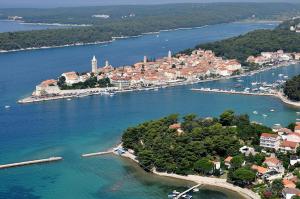 an aerial view of a small island in a body of water at Sweet home in Rab
