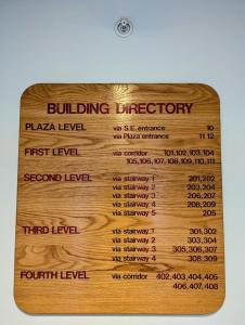 a menu for a building directory on a table at Liftside 203 by SummitCove Lodging in Keystone