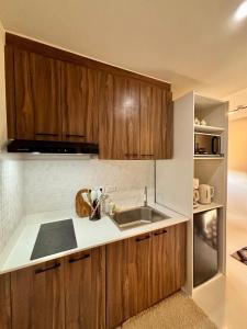 Kuchyň nebo kuchyňský kout v ubytování Cozy & Scenic Nature Apartment + 8 fotografií