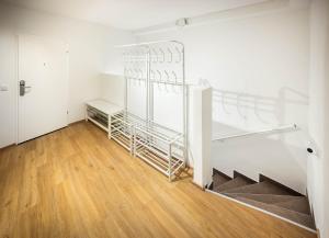Postel nebo postele na pokoji v ubytování Jimmys Apartments XXL
