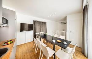 TV a/nebo společenská místnost v ubytování Jimmys Apartments XXL