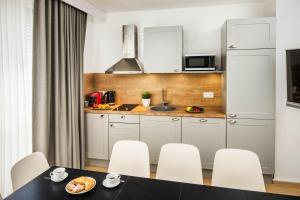 Kuchyň nebo kuchyňský kout v ubytování Jimmys Apartments XXL