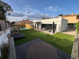 Zahrada ubytování ESPECTACULAR CASA EN LLAGOSTERA - Costa Brava, CON PISCINA