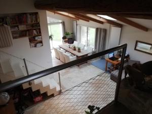 an overhead view of a living room and dining room at country house in Provence in Pierrevert