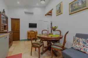 TV a/nebo společenská místnost v ubytování Casa Gavì + 17 fotografií