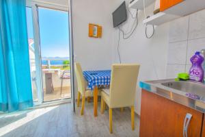 Kuchyň nebo kuchyňský kout v ubytování Apartment Goran