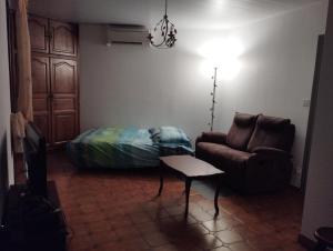 Posezení v ubytování Comme chez Mamies + 2 fotografie