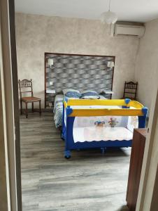 Postel nebo postele na pokoji v ubytování Comme chez Mamies