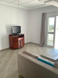 TV a/nebo společenská místnost v ubytování Appartement Sousse 1