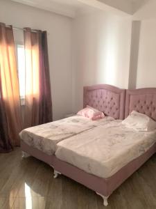 Postel nebo postele na pokoji v ubytování Appartement Sousse 1