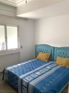 Postel nebo postele na pokoji v ubytování Appartement Sousse 1