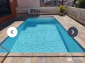 Piscina en o cerca de Apto com 1 dormitorio proximo a praia