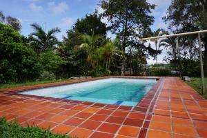 Bazén v ubytování Campo y Descanso 15 min Ciudad Apto 01 nebo v jeho okolí