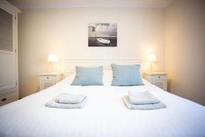 Cama ou camas em um quarto em Villa Lena