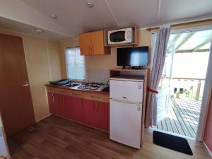 Photo de la galerie de l'établissement mobil Home à Meschers au camping l'Escale proche de Royan, à Meschers-sur-Gironde