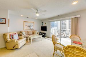 a living room with a couch and a table at 200 Feet to Beach Inviting Condo in Ocean City! in Ocean City