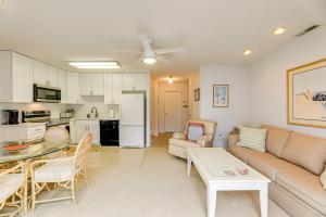 a living room with a couch and a table at 200 Feet to Beach Inviting Condo in Ocean City! in Ocean City