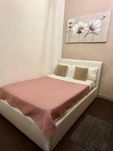 Postel nebo postele na pokoji v ubytování Mazzini House