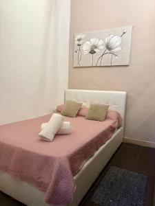 Postel nebo postele na pokoji v ubytování Mazzini House