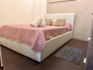 Postel nebo postele na pokoji v ubytování Mazzini House