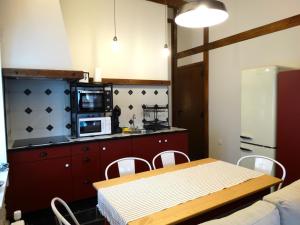Kuchyň nebo kuchyňský kout v ubytování Apartamentos Minas de Silvarosa