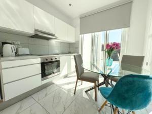 Køkken eller tekøkken på Nissi49 Boutique Apartments