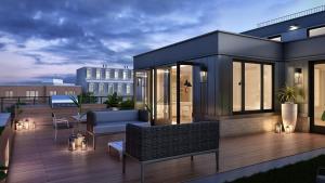 a rendering of a rooftop patio of a building at Hala DC in Washington