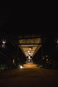 a large building with a hallway at night at Wao Beach Venao in Playa Venao +59 photos