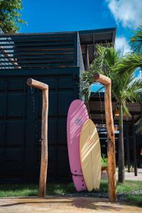 a couple of surfboards sitting on a bench at Wao Beach Venao in Playa Venao