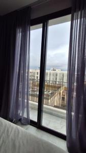 Ένα ή περισσότερα κρεβάτια σε δωμάτιο στο Modern apartment in Casablanca