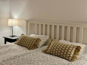 Łóżko lub łóżka w pokoju w obiekcie Apartament w kamienicy Gdynia