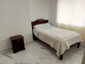 Postel nebo postele na pokoji v ubytování Hotel CasaBlanca"Tablon de miraflores"