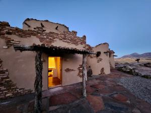 an outside view of a building in the desert at Sky Village in Cortez