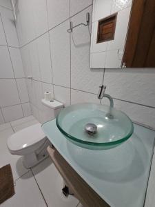 a bathroom with a sink and a toilet at Suítes Milagres Bontempo in São Miguel dos Milagres +51 photos