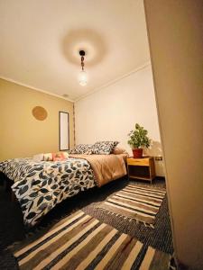 Postel nebo postele na pokoji v ubytování Hostal SaraTierra