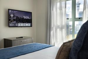Sjónvarps- og/eða afþreyingartæki á Quest Auckland Serviced Apartments