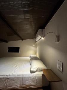 Voodi või voodid majutusasutuse Departamentos confortables en Caacupé toas