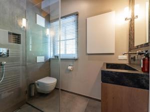 Koupelna v ubytování Chalet Schneelöwe XL