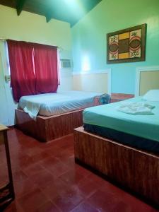 Voodi või voodid majutusasutuse Hotel Kevin toas