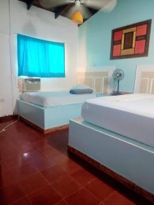 Voodi või voodid majutusasutuse Hotel Kevin toas