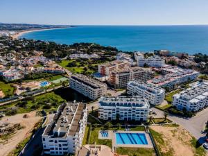 an aerial view of a resort near the ocean at Estúdio AMar - Always Algarve in Porches