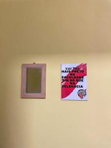 Πιστοποιητικό, βραβείο, πινακίδα ή έγγραφο που προβάλλεται στο Studio no centro do Rio de Janeiro, ao lado do sambódromo