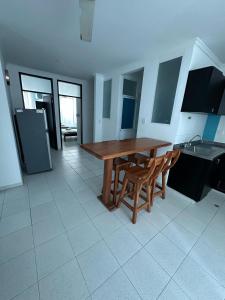 Kuchyň nebo kuchyňský kout v ubytování SGH Rodadero Suites