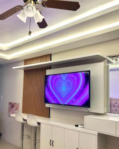 TV a/nebo společenská místnost v ubytování C&K Staycation