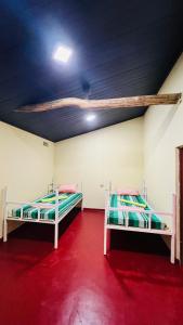 Postel nebo postele na pokoji v ubytování Hakuna Matata Hostel