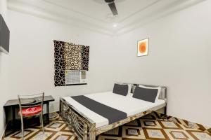 Televisyen dan/atau pusat hiburan di Hotel O Relax Inn