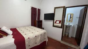 Postel nebo postele na pokoji v ubytování Hotel Marjenny