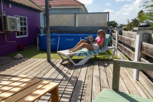 Balkón nebo terasa v ubytování Luxe centraal gelegen appartment met privé zwembad