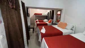 Postel nebo postele na pokoji v ubytování Hotel Marjenny