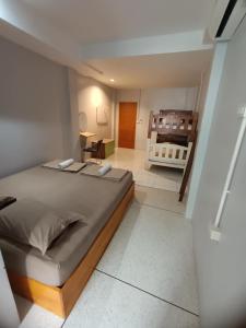 Postel nebo postele na pokoji v ubytování Ler Hostel 65